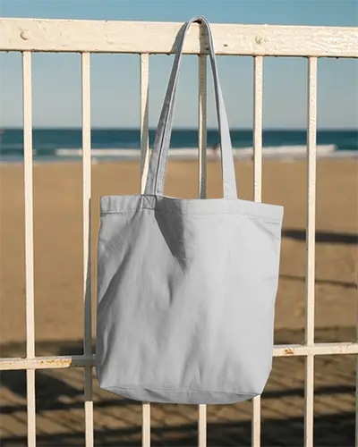 Minimalist Cotton Tote Bag Mockup Hanging On Fence Ideal For Custom Branding And Printing