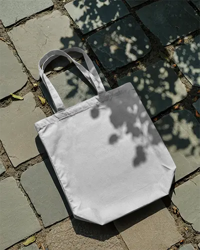 rustic-stone-path-tote-bag-mockup-under-tree-shadows-natural-lighting-eco-friendly-fashion-style