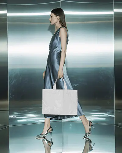 Metallic Studio Tote Bag Mockup Woman In Silver Dress Posing In Futuristic Mirror Environment