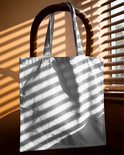Stylish Minimalist Tote Bag Mockup With Dynamic Light And Shadow Patterns For Branding