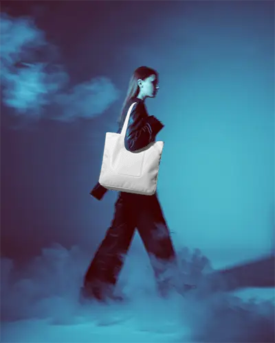 Premium Large Capacity Tote Bag Mockup Featured On Female Model Carrying Around