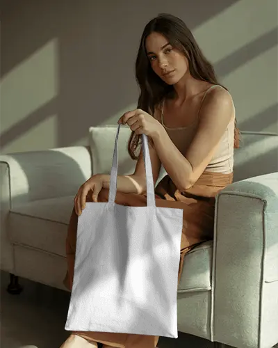 Fashionable Woman Presenting Simple Carry All Tote Bag Mockup For Daily Use