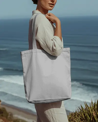 Coastal Tote Bag Mockup Woman Standing By Ocean In Natural Sunlit Setting