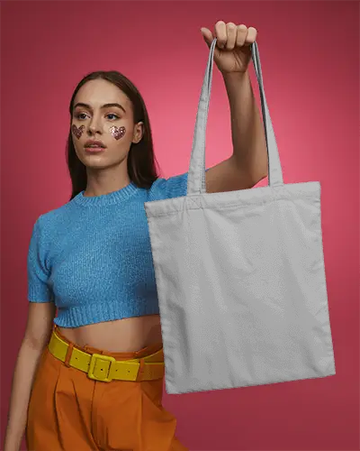 Bold Fashion Tote Bag Mockup Woman Posing With Raised Arm In Colorful Studio