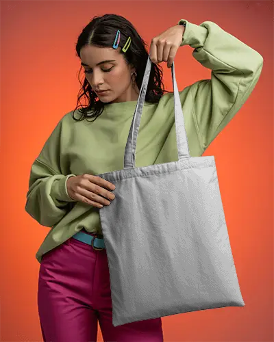 Vibrant Fashion Tote Bag Mockup Female Model In Bright Outfit In Studio Light