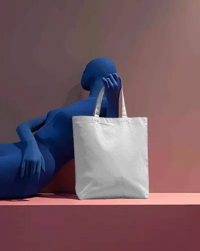 Artistic Studio Totebag Mockup Canvas Bag With Reclining Blue Mannequin Soft Gradient Backdrop