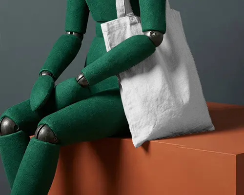 Modern Studio Totebag Mockup Canvas Bag On Green Mannequin Seated On Orange Block