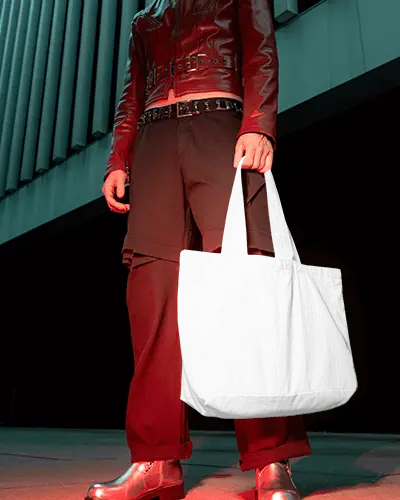 Urban Night Totebag Mockup Light Canvas Bag Held By Model In Modern Architecture Setting