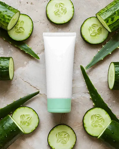 natural-skincare-tube-mockup-for-organic-beauty-products-with-fresh-cucumber-and-aloe-leaves