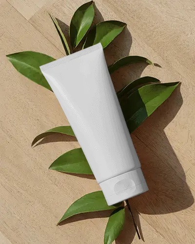 eco-friendly-tube-mockup-with-leaves-for-green-wellness-brand-visuals