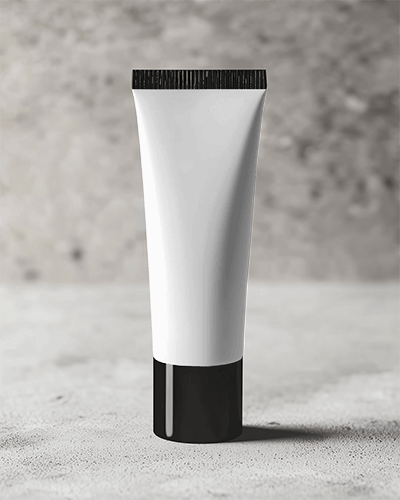 angled-view-cosmetic-tube-mockup-on-concrete-surface-shadow-play-for-dynamic-product-presentation
