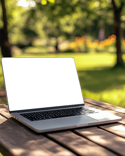 Outdoor Park Laptop Mockup Side View Wooden Table Greenery Background 0102