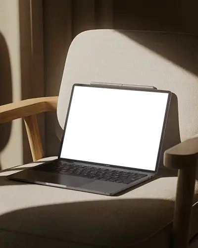 Sunlit Home Office Laptop Mockup Laptop On Minimal Fabric Chair With Wooden Armrests