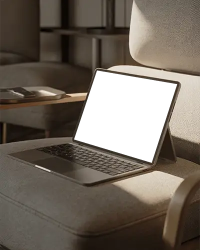 Tablet Style Laptop Mockup Detachable Keyboard On Soft Chair In Sunlit Modern Interior