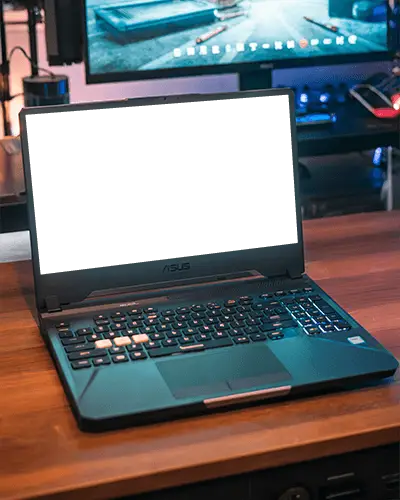 Asus Gaming Laptop Mockup On Wooden Desk Setup And Background Monitor