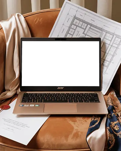 Acer Laptop Mockup On Suede Chair With Blueprints Documents And Silk Fashion Elements