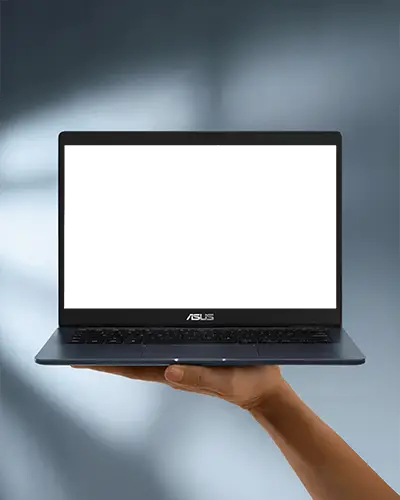Hand Holding Asus Laptop Mockup With Blank Black Screen Against Blurred Background