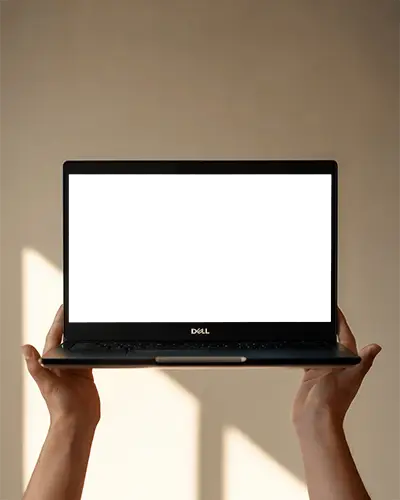 dell-laptop-mockup-held-up-by-hands-in-soft-natural-light-with-minimal-wall-background