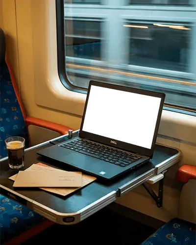 Modern Dell Laptop Mockup Digital Device On Train Table With Coffee And Letters Travel Setting