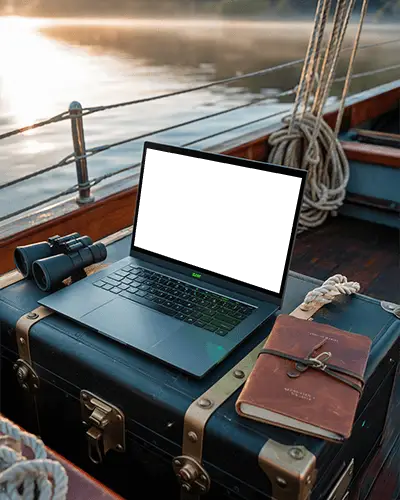 nautical-scene-razer-laptop-mockup-on-ship-deck-with-binoculars-and-leather-journal