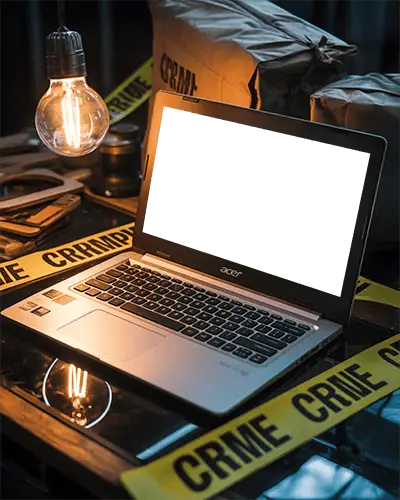 Acer Laptop Mockup On Desk Surrounded By Crime Scene Tape And Evidence Bags In Moody Light
