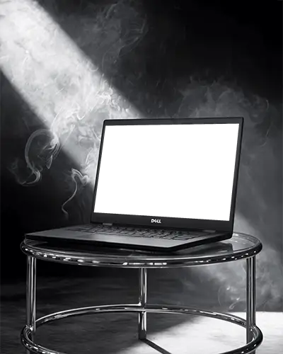 Dell Laptop Mockup On Modern Round Table With Dramatic Smoke And Spotlight In Dark Room