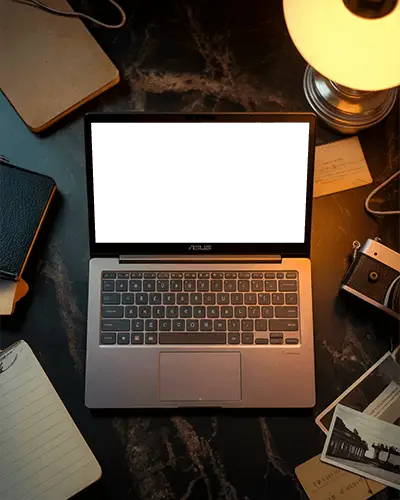 Asus Laptop Mockup On Desk With Warm Lamp Light And Vintage Camera In Cozy Creative Scene