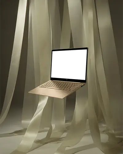 Hp Sleek Modern Thin Laptop Mockup Among Soft Transparent Fabric For Creative Technology Showcase