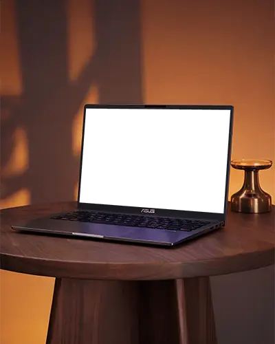 Asus Professional Laptop Mockup With Open Screen On Round Wooden Table In Cozy Setting