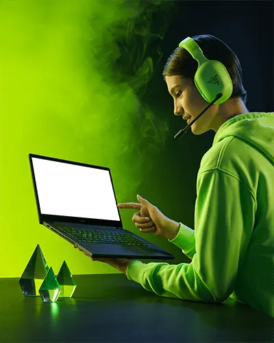 Modern Gaming Laptop Setup With Headset Person Pointing At Touchscreen Design Mockup