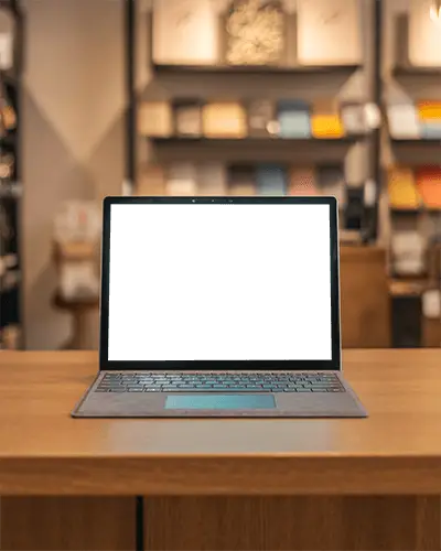 Modern Laptop Mockup Display On Wooden Table With Blurred Background For Design Presentation