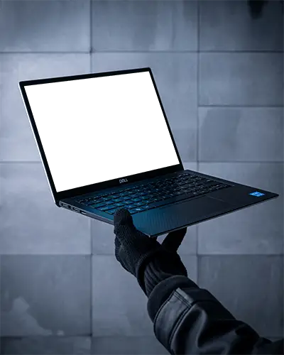 Dell Laptop Mockup Held By Gloved Hand Against Dark Stone Tile Wall In Industrial Modern Setting