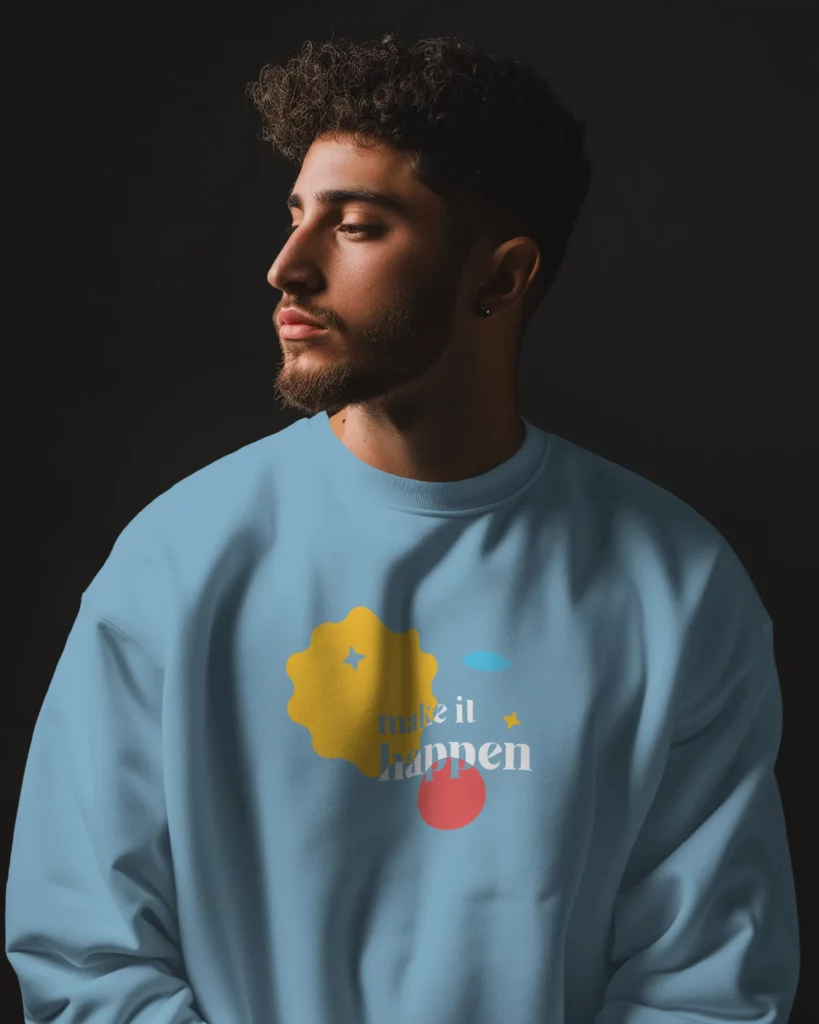 man wearing sweatshirt mockup in dark studio