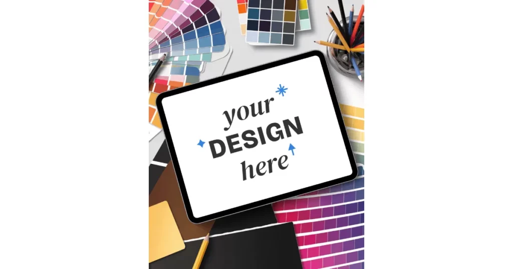 pantone swatches lie around an ipad pro