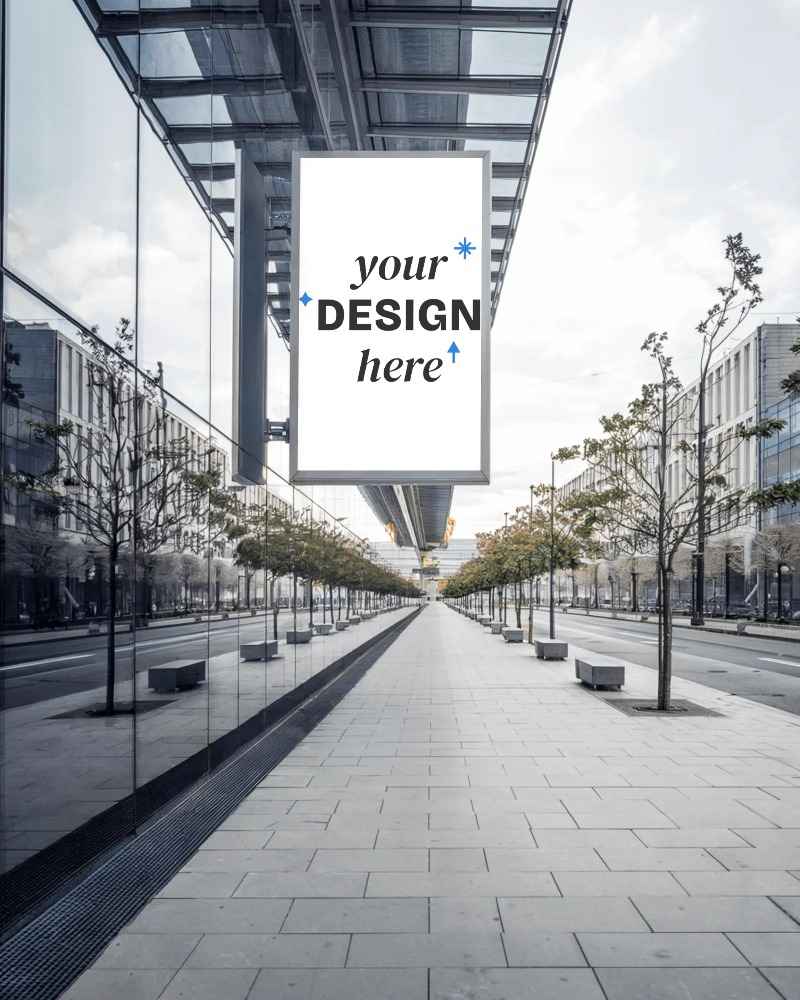 city hanging billboard mockup on glass covered path with geometric paving and trees









