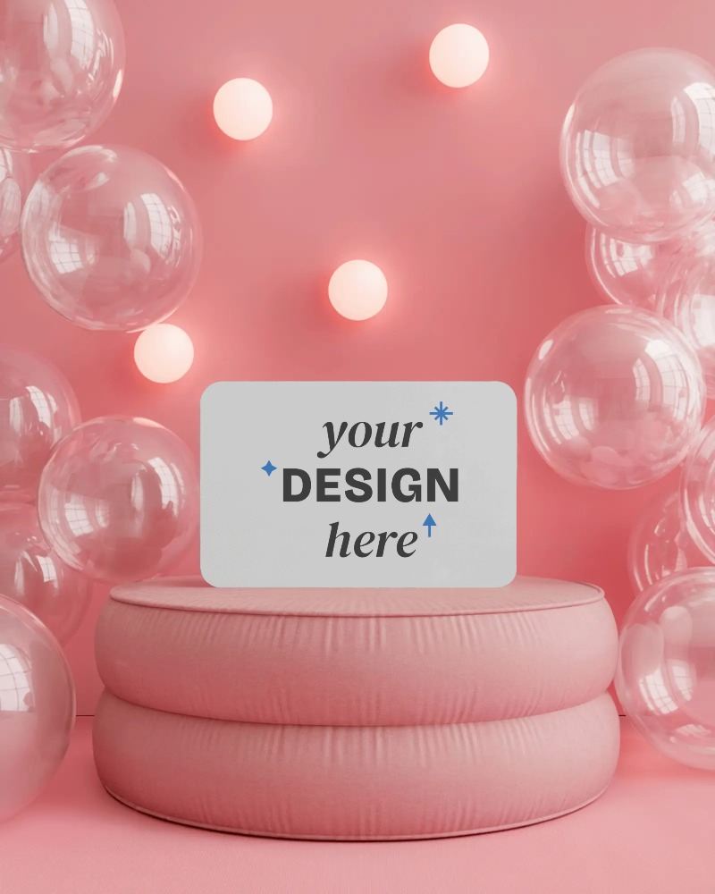 round corner business card mockup on soft pink cushion with balloons and wall lights








