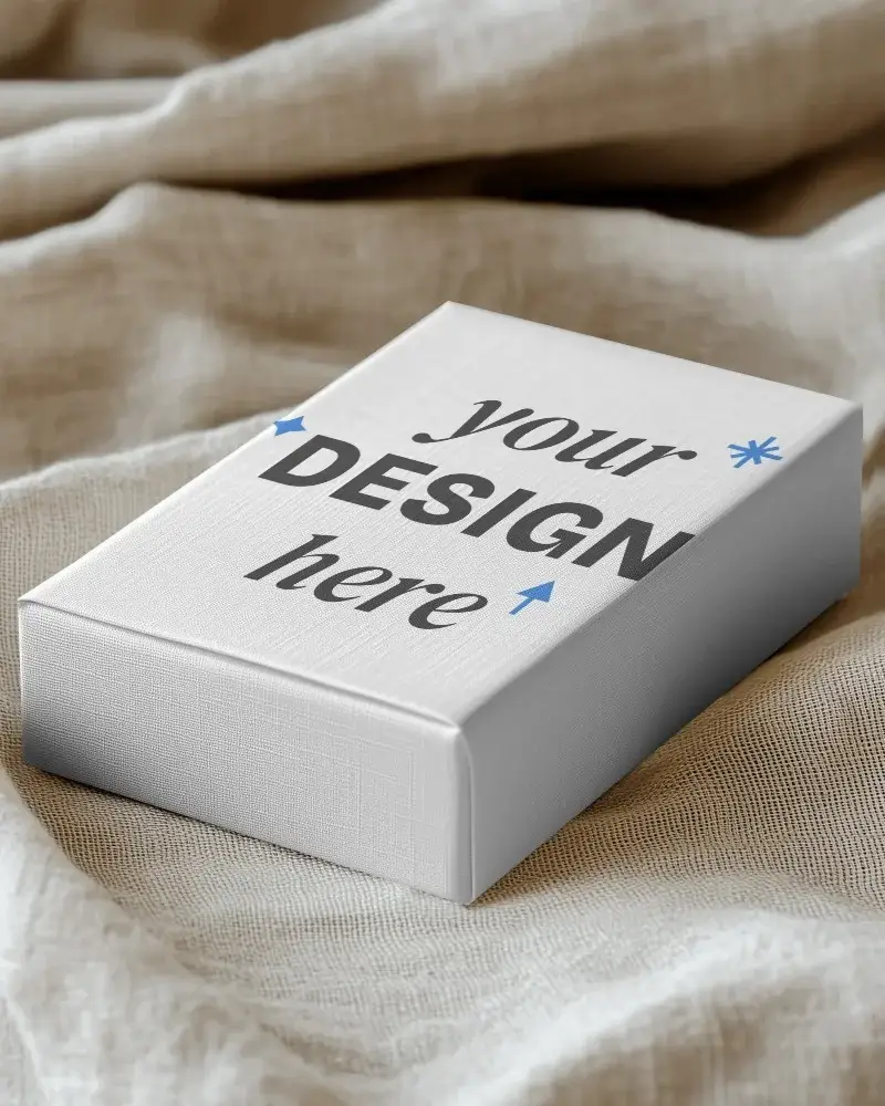 textured box mockup on linen fabric soft lighting premium packaging display
