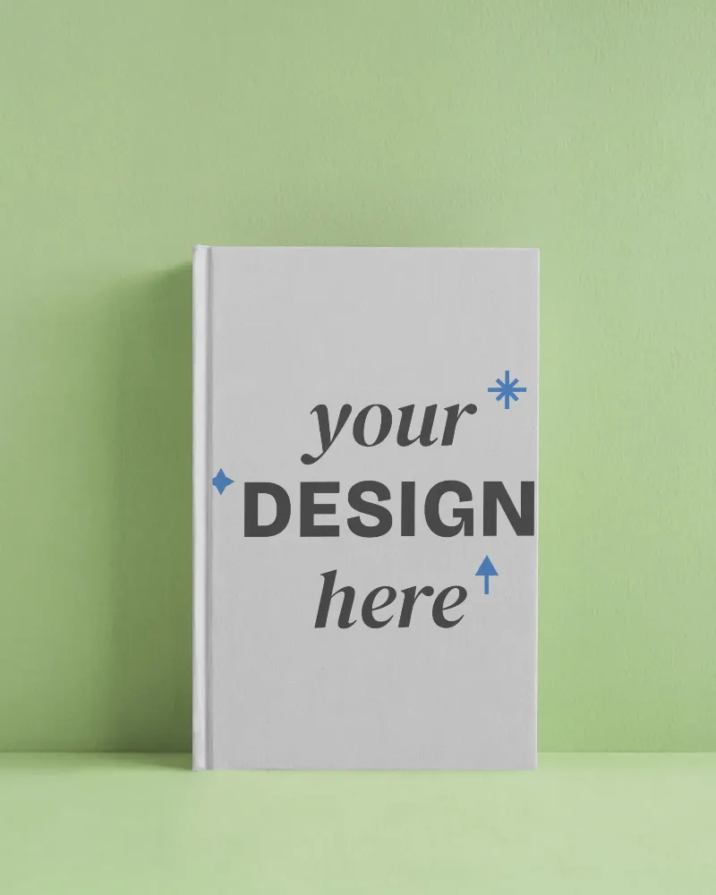 upright blank book mockup on pastel green textured